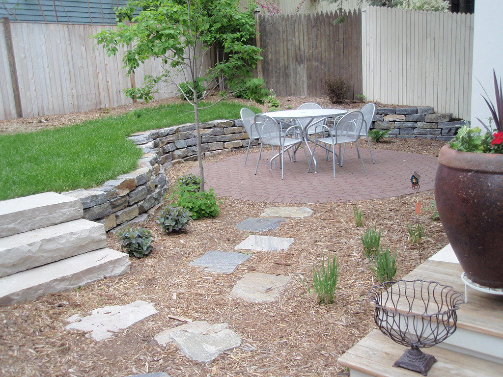Stone patio hardscape with professional pavers